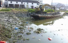 垃圾河难整治 先填埋再造路